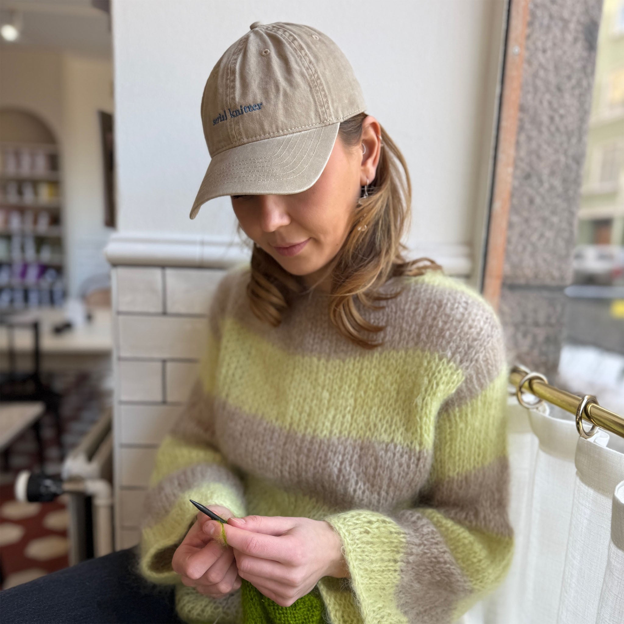 Knitters & Friends cap, Serial Knitter